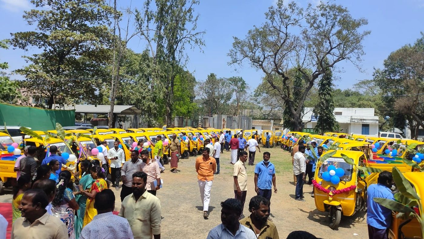 Dozens of KAFE 300+ vehicles gathered on a ground for a mass delivery event